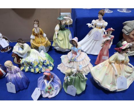 Nine Royal Doulton figures including Coralie, Buttercup, Kathleen, Solitude, Day Dreams, Sunday Best, Fair Maiden, Monica and