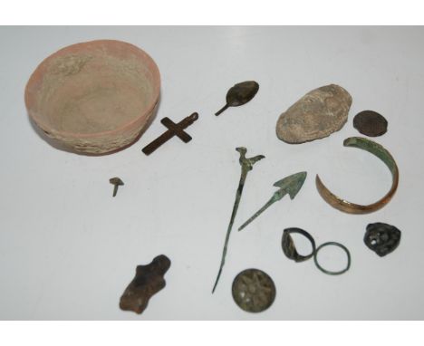 A collection of Egyptian and medieval archaeological finds including bowl, bangle, arrow heads etc Condition report: Availabl