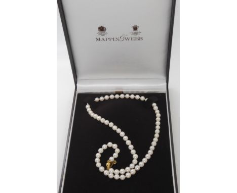 A string of white pearls with an 18ct gold clasp, retailed by Mappin & Webb, with original box. Length 52cm Condition report: