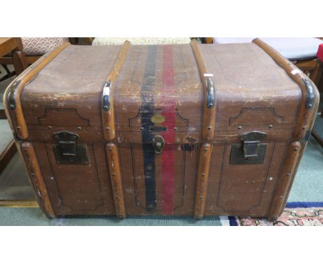 A 20th century Liprosta wood bound travel trunk, a brass framed tapestry fire screen, a wall mirror and a quantity of linen (