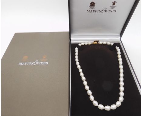 A string of white oval pearls with a 14k gold clasp, retailed by Mappin & Webb, with original boxes. length 46cm Condition re