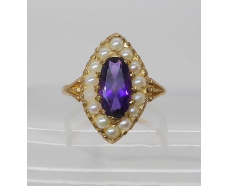 A 9ct amethyst and pearl cluster ring, finger size P, weight 4gms Condition report: Available upon request