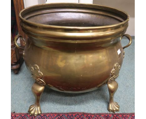 A 19th century brass planter on lion's paw feet Condition report: Planter is in good general condition consummate with age an