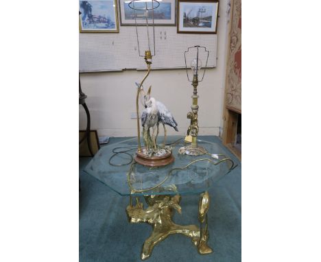 A 20th century oriental style brass bird based glass top lamp table,an oriental circular brass top table,a root wood occasion