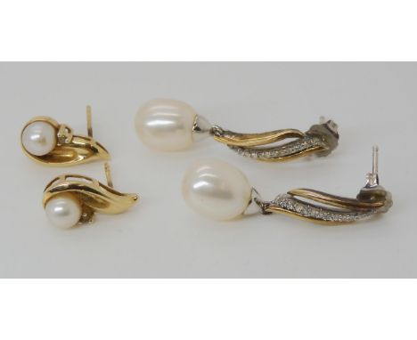 A pair of 14k yellow and white gold pearl and diamond drop earrings length 3.1cms, weight 4.4gms, and a further pair of 10k g