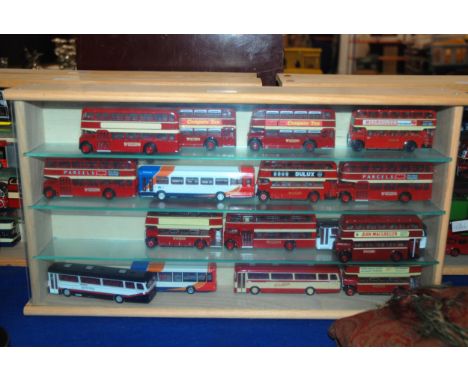 Five display cases of model buses and a box of various model buses Condition report: Available upon request