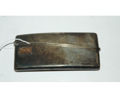 A silver card case London 1935 rectangular curved body with engine turned decoration monogrammed "BWH" 8.5 cm x 4 cm 44 grams