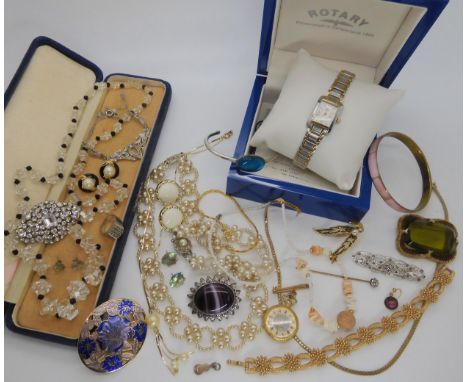 A Trifari bracelet, a Deco clear and black glass bead necklace, boxed Rotary watch and other items Condition report: Not avai
