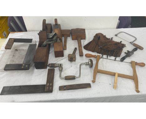 Large selection of assorted tools includes wood working tools, hand held drill, level etc 
