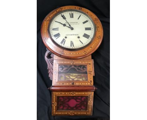 Anerican drop dial wall clock, the dial is sighen W.C North 48 and 50 northampton st leicester" with key and pendulum 