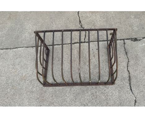Vintage hay manger measures approx 15.5 inches tall by 27 inches wide and 17 deep 