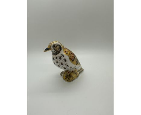 A Royal Crown Derby paperweight, Song Thrush, 11cm high, gold stopper, red printed marks and Royal Crown Derby stamp to the b