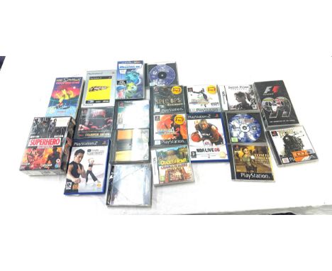 Selection of vintage and later play station games, DS games, DVDs and videos - all in cases to include Tomb Raider, The Simps
