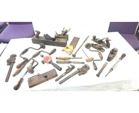 Selection of vintage tools including planes, drills, saws, renches etc 