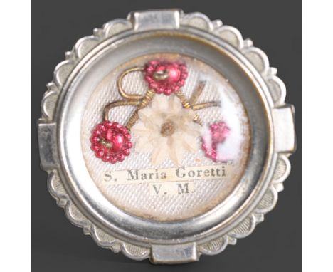 Curiosity/Macabre: Theca Reliquary Relic of Saint Maria Goretti Mid-20th century round glass-fronted silvered metal theca hou