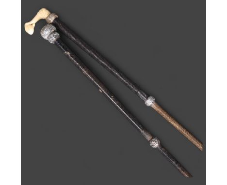 Natural History : Two ladies silver mounted hunting whips, one with carved bone claw, length 58cm, (2). 