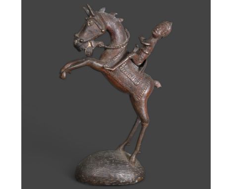An African tribal bronze horse and rider from Mali, height 39cm. 