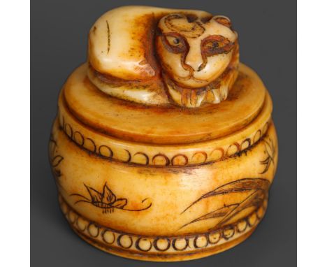 Carved Bone Pill Box with Cat curled up on lid. Hand carved bone small round box, either for pills or snuff, with curled up c