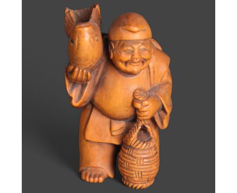 Netsuke: Boxwood FishermanA man carrying a large fish on his shoulder and holding basket. Signed to bottom of foot. 