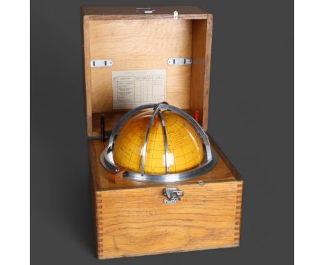 An early 20th Century Russian made Star Globe, in original fitted wooden box, label to inside of lid, case width 25cm. 