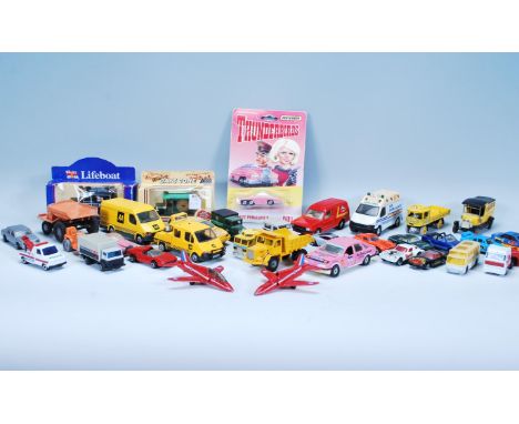 A collection of vintage diecast toy cars and vehicles to include Triang Minic Toys truck, Matchbox Thunderbirds, Lledo Lifebo