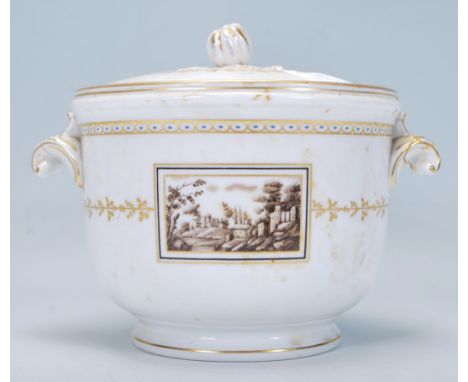 A 20th Century Richard Ginori Pittoria pattern ice bucket raised on a round footed base with scrolled leaf handles and pumpki