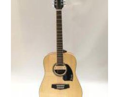 An Ibanez 12 string acoustic guitar, model number PF1512-NT. Fitted with an Artec pickup. Comes supplied with original retail