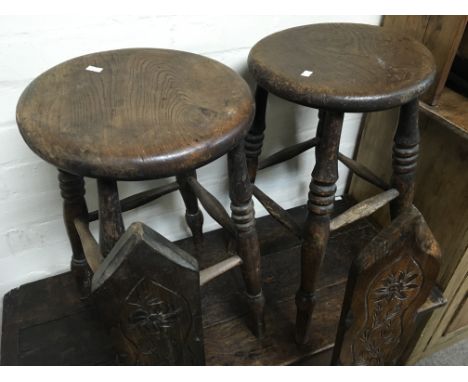 A pair of Victorian Vernacular elm and beechwood stools with ring turned legs and a pair of carved Continental chairs (4)
