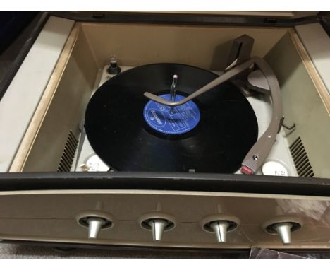 A 1950s Pye record player in mahogany case.