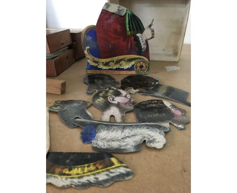 A collection of Edwardian and later games including cribbage boards .