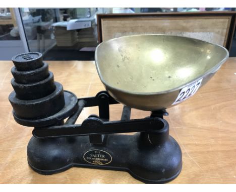 A Salter brass and Iron set of kitchen scales and weights