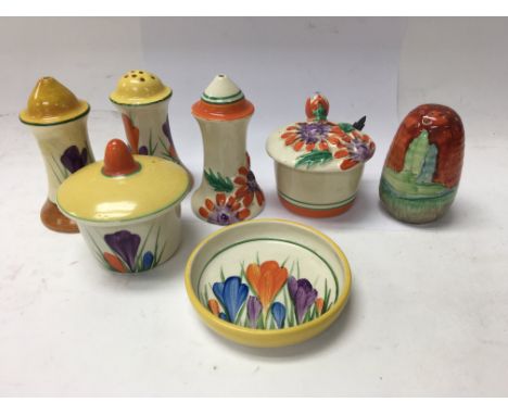 A collection of Clarice Cliff cruets including forest Glenn and crocus .(7)