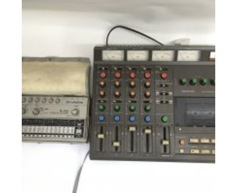 A Tascam 244 Portastudio and manual together with a Roland TR606 Drumatix drum machine with original carry case (2).