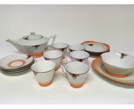 An Art Deco design tea set decorated with orange and black pattern only four saucers and side plates no obvious damage.