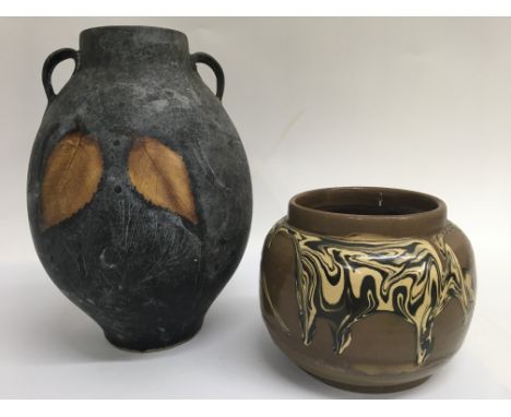 A Chinese pottery vase with leaf print design, together with a pottery drip glaze vase. General ware, firing faults, no damag