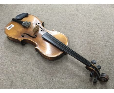 An unmarked students violin. Button to back measuring 36cm