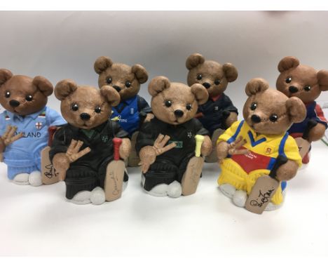 A collection in three boxes of bespoke ceramic teddy bears in cricketer outfits and all signed by famous cricketers including