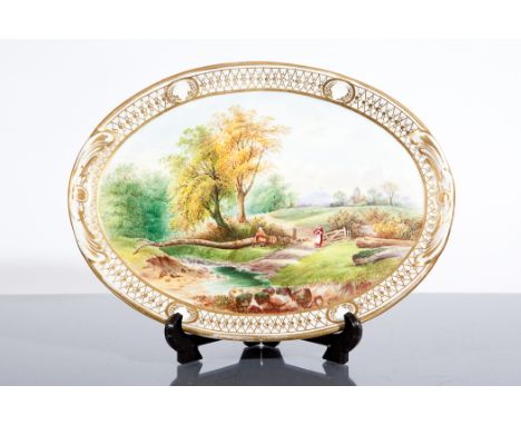 VICTORIAN GILT PORCELAIN TEAPOT STAND of oval form, decorated with country scene, unmarked, 26cm long