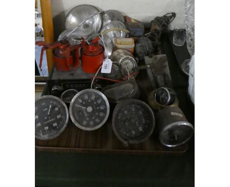 A Tray Containing Vintage Automobile Sundries to Include Speedometers, Lucas Headlight and Spot Lights, Oil Cans etc
