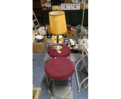 A Pair of Circular Topped Stools and a Table Lamp 