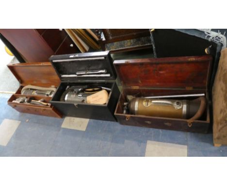 Three Cased Vintage Electric Cylinder Vacuum Cleaners 