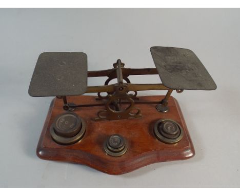 A Set of Brass Postage Scales on Mahogany Plinth, Complete with Weights