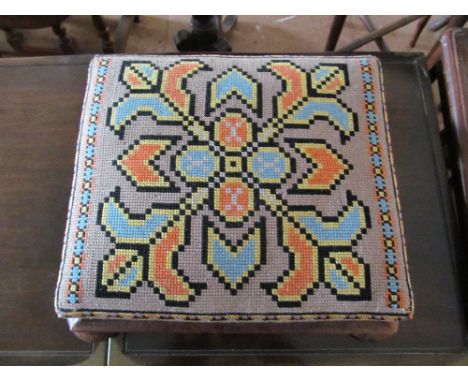 A tapestry top stool