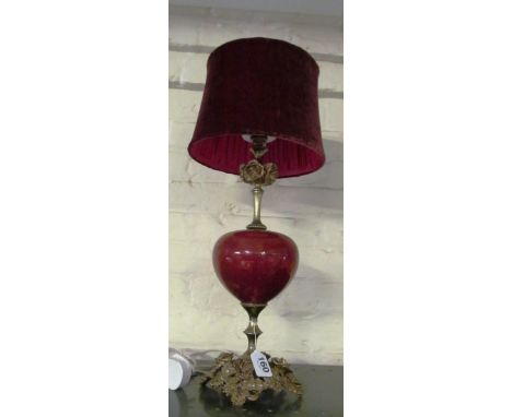 A table lamp with pink lustre centre and gilt rose design base