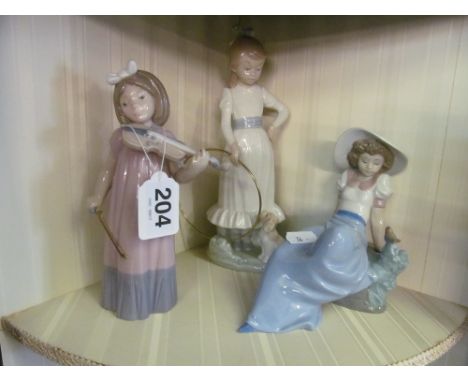 A Nao figure girl with hoop and dog, another girl playing violin and another girl with bird