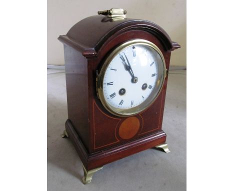 An Edwardian mahogany mantel clock