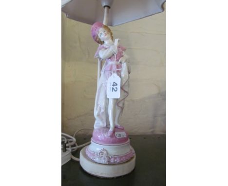 A late 19th Century figure of a gallant in pink and white clothing (a/f) converted to a lamp