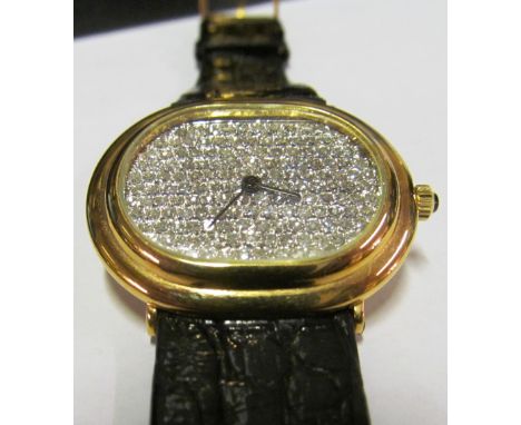 A Baume Mercier 18ct gold diamond faced watch