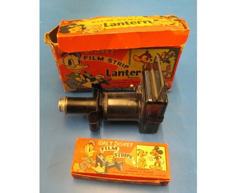 A Mickey Mouse Film Star lantern and film strips in original box and an Ace projector with Dixon of Dock Green film strip