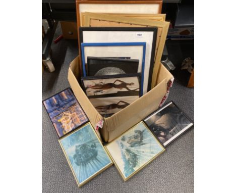 A group of mixed framed photographs and prints.
